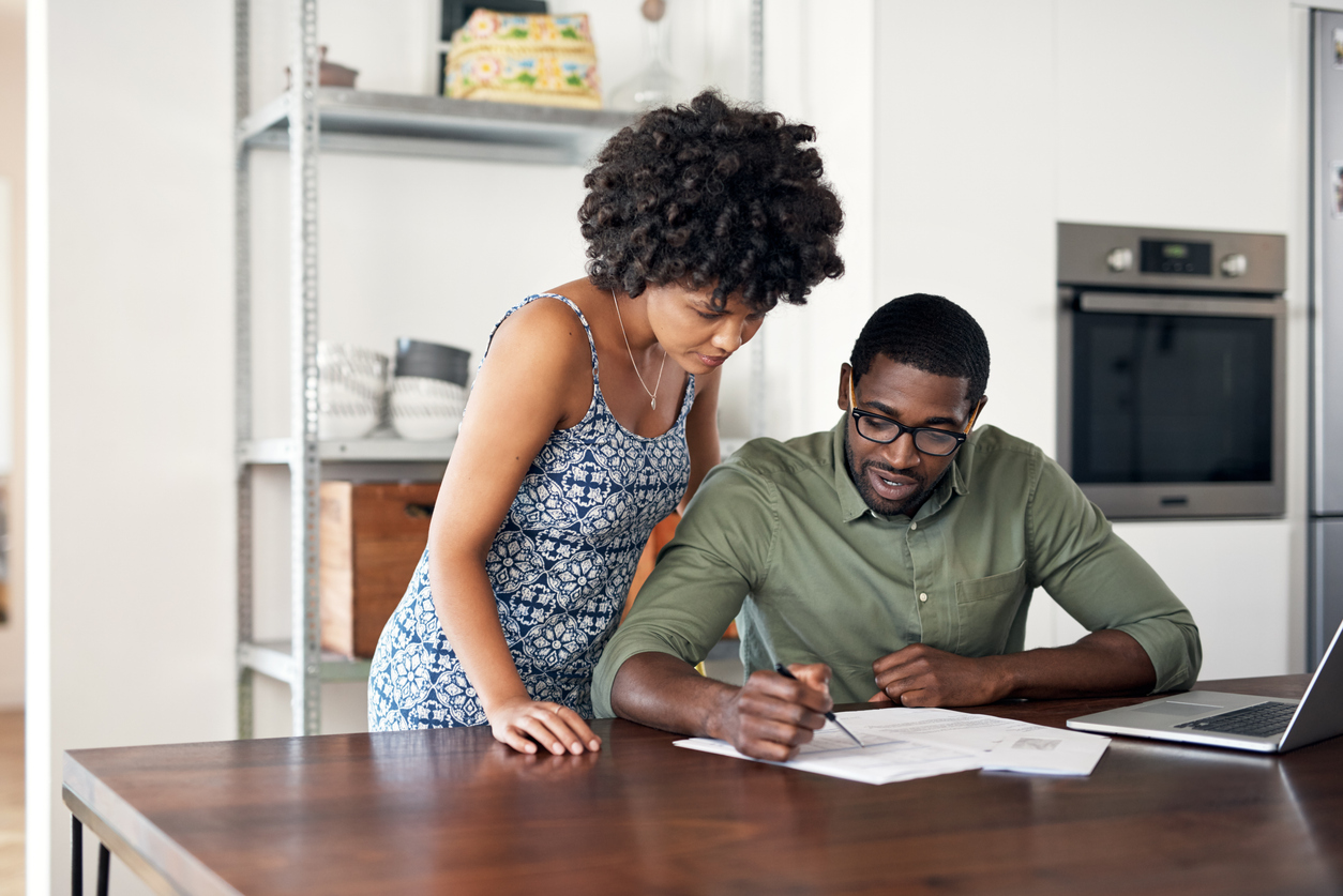 Couple reviewing documents together