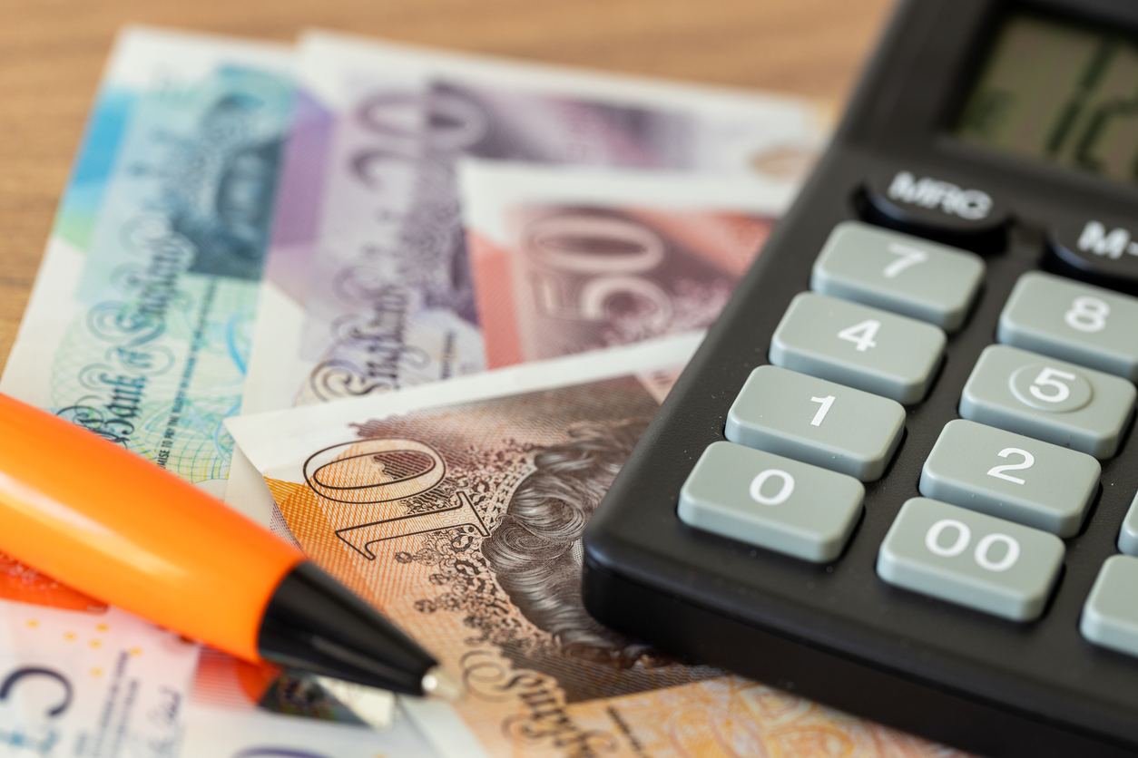 Calculator and pound notes